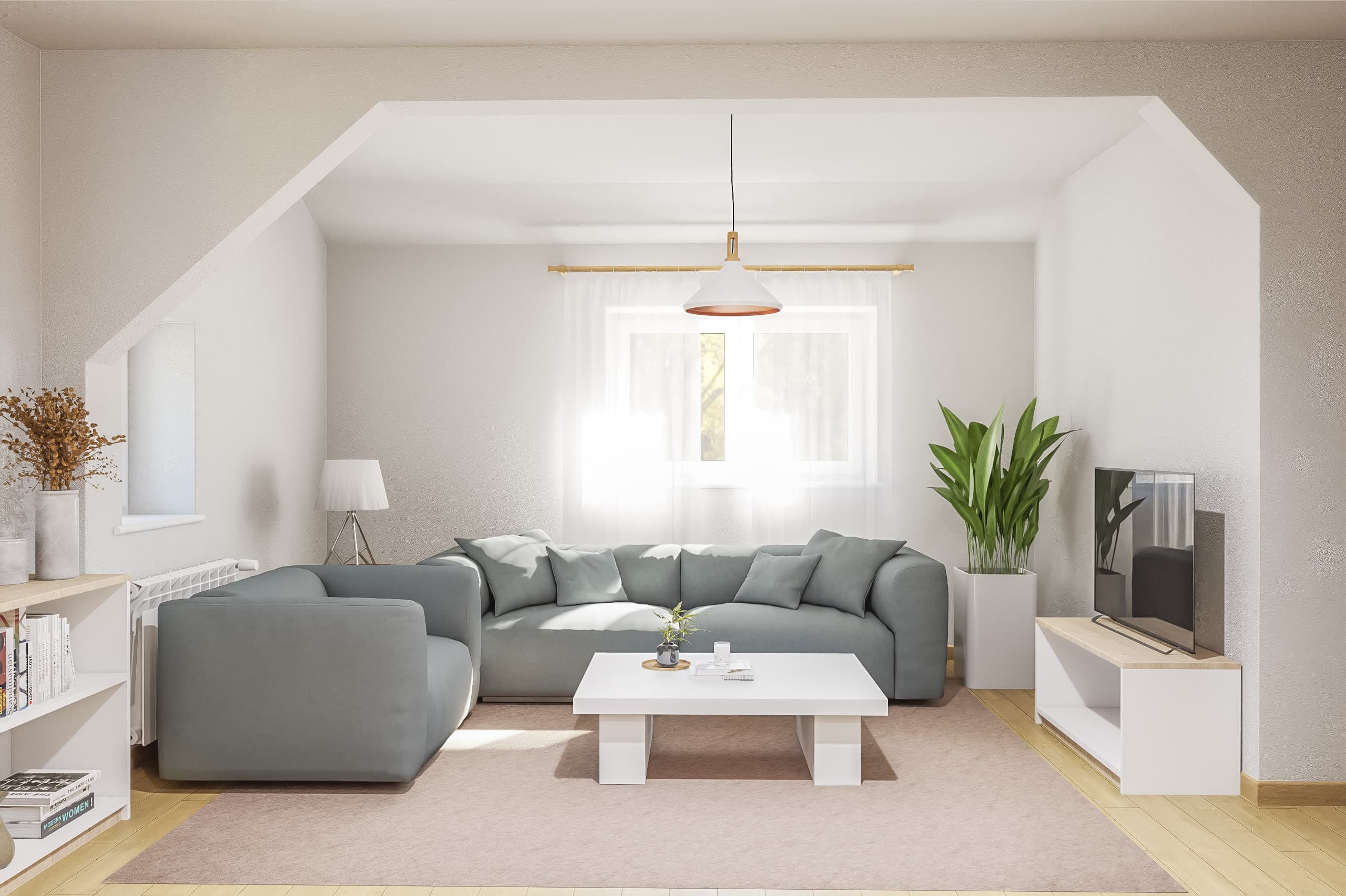 Living room under the sloped attic roofline, with a grey sectional sofa facing the dormer window