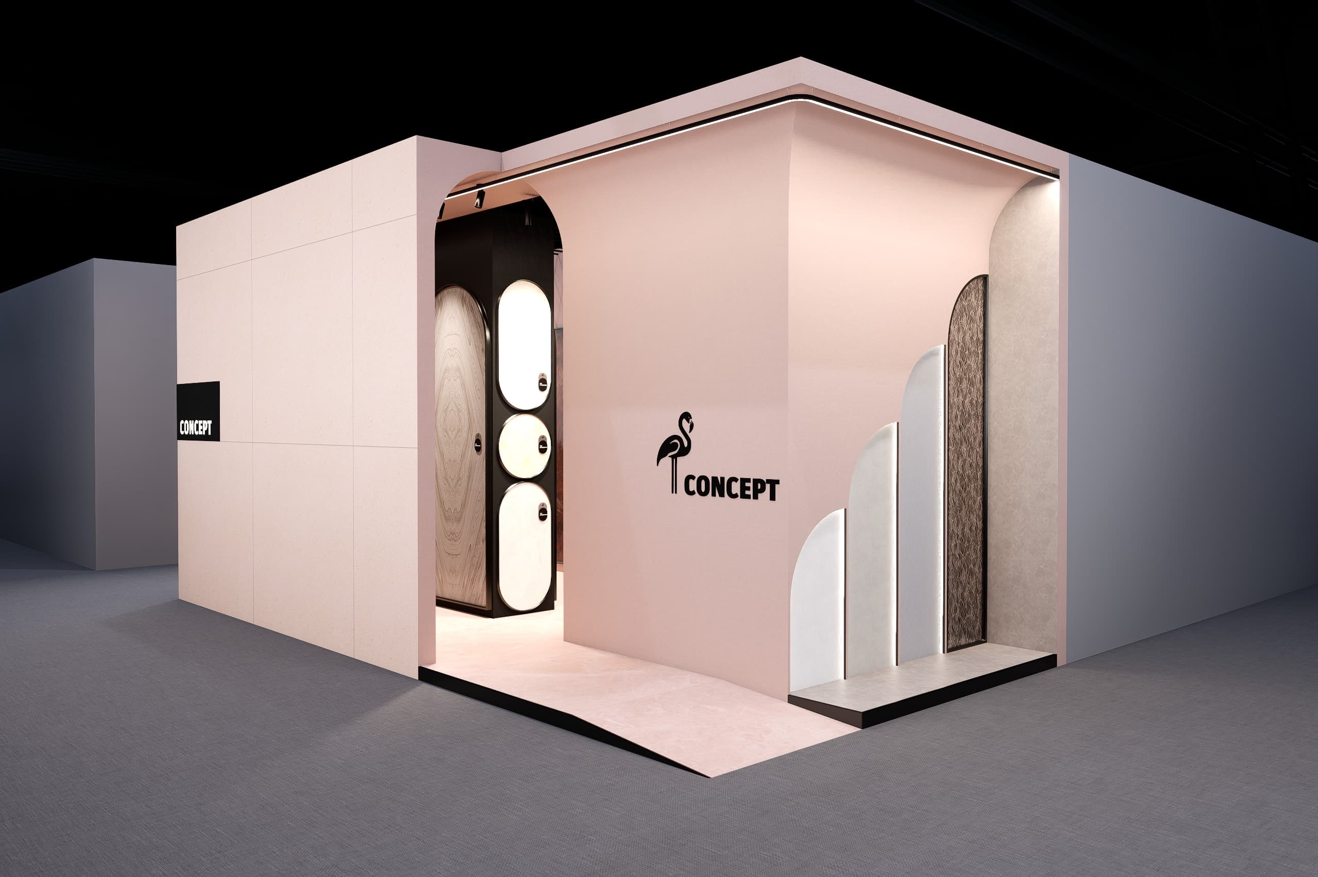 Corner view of the stand at the fair, with the Concept flamingo mark and the arched material display beyond